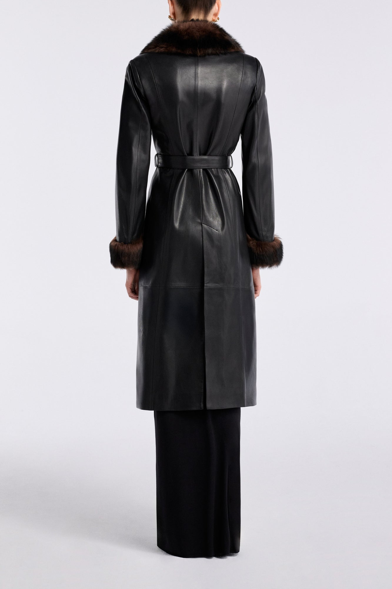 Model is wearing Nour Hammour Baez Luxe Leather Coat Noir Classique - Back