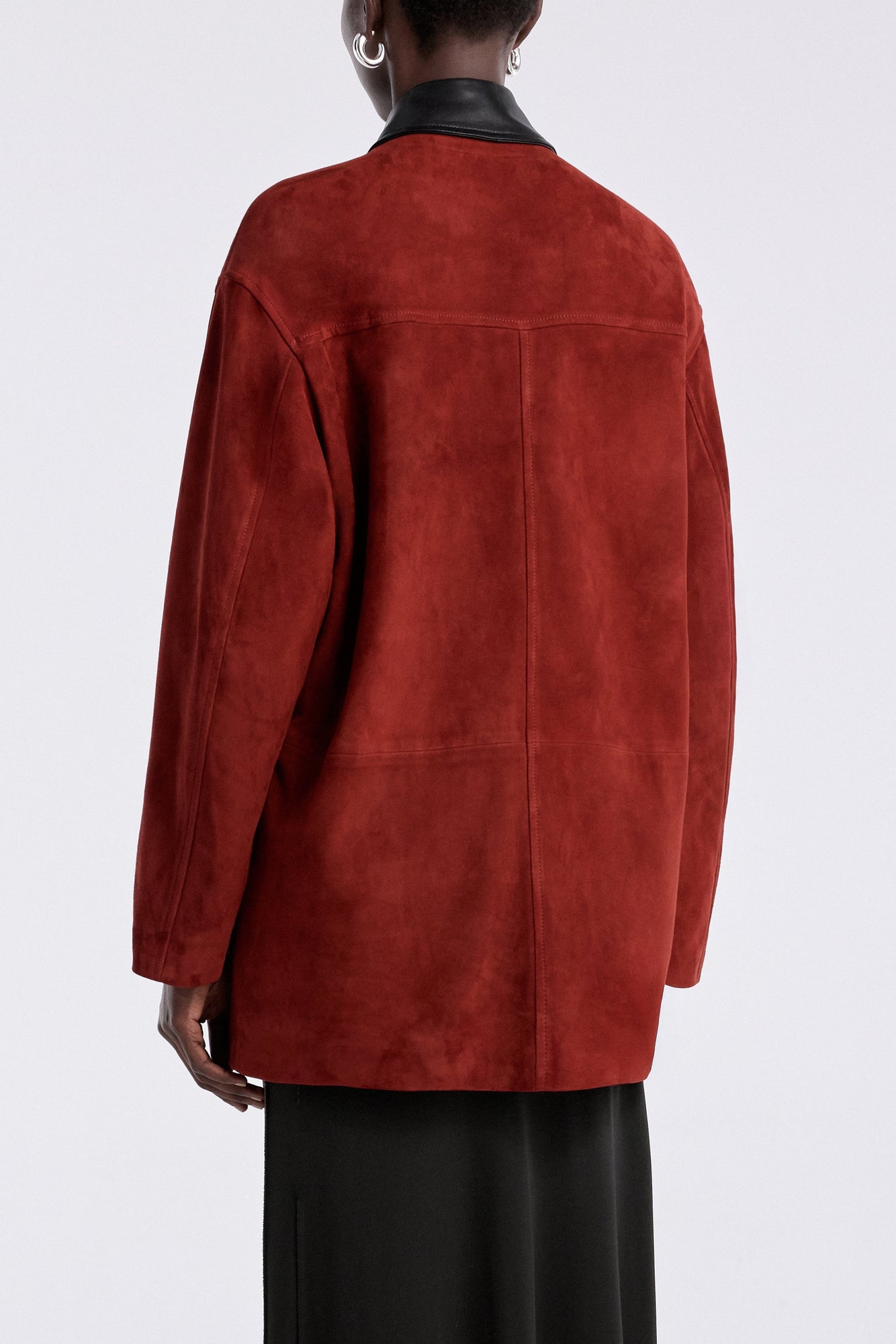 Model is wearing the Nour Hammour Barn Modern Suede Jacket Rouge - Back