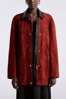 Model is wearing the Nour Hammour Barn Modern Suede Jacket Rouge - Front Open