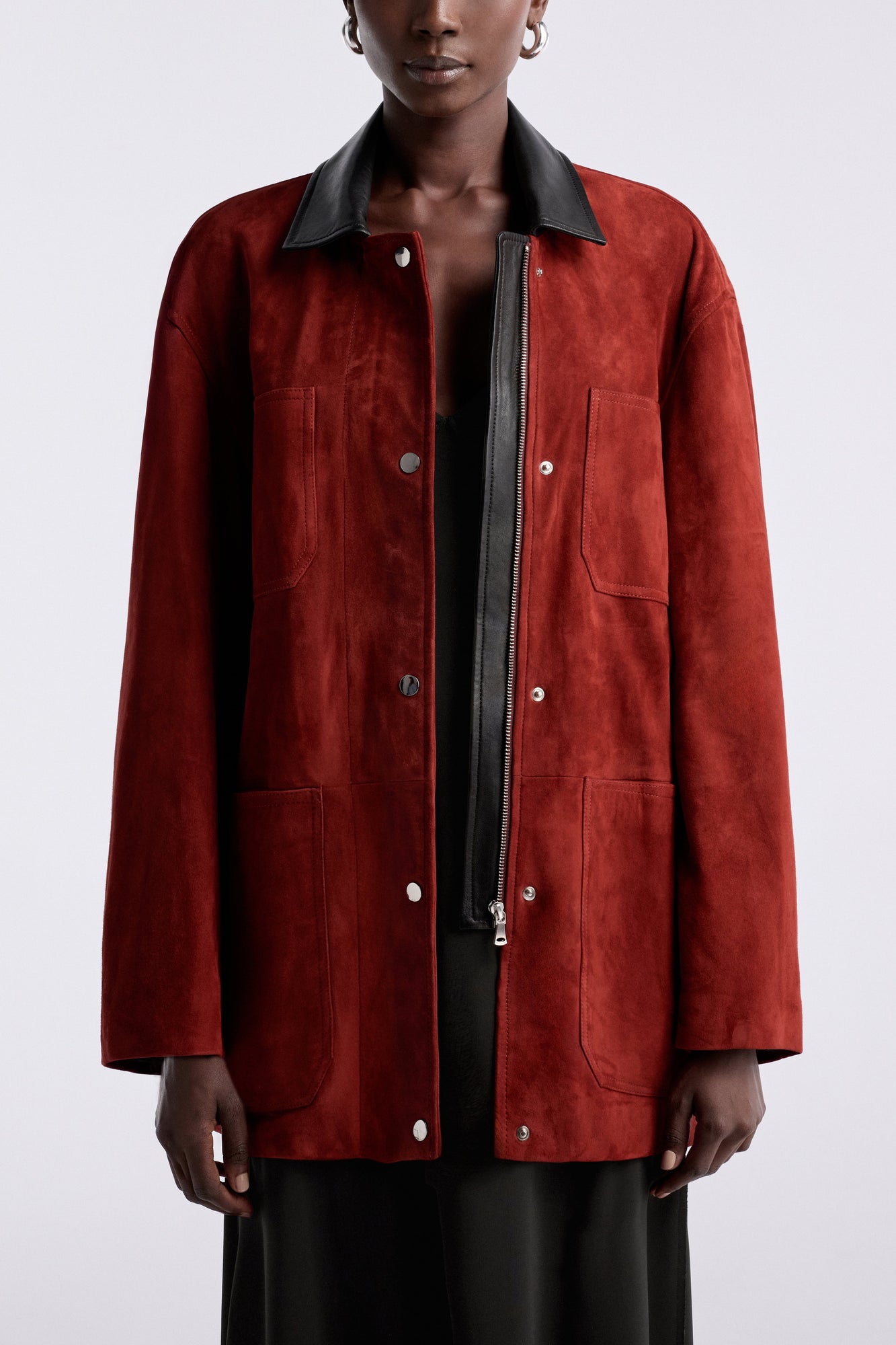 Model is wearing the Nour Hammour Barn Modern Suede Jacket Rouge - Front Open
