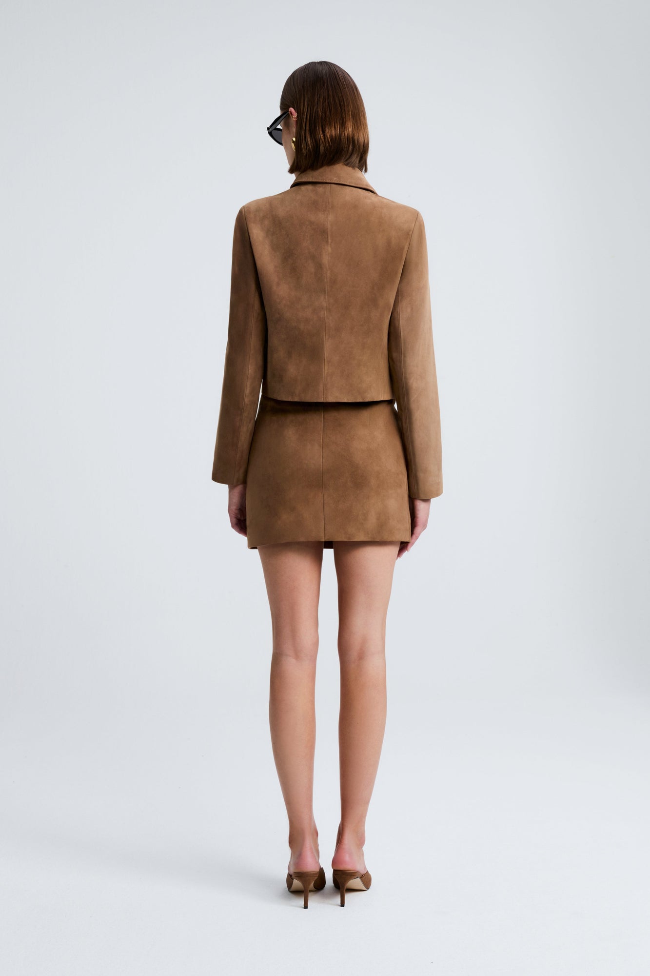 Model is Wearing the Nour Hammour Bleeker Fitted Suede Jacket Tobacco - Back