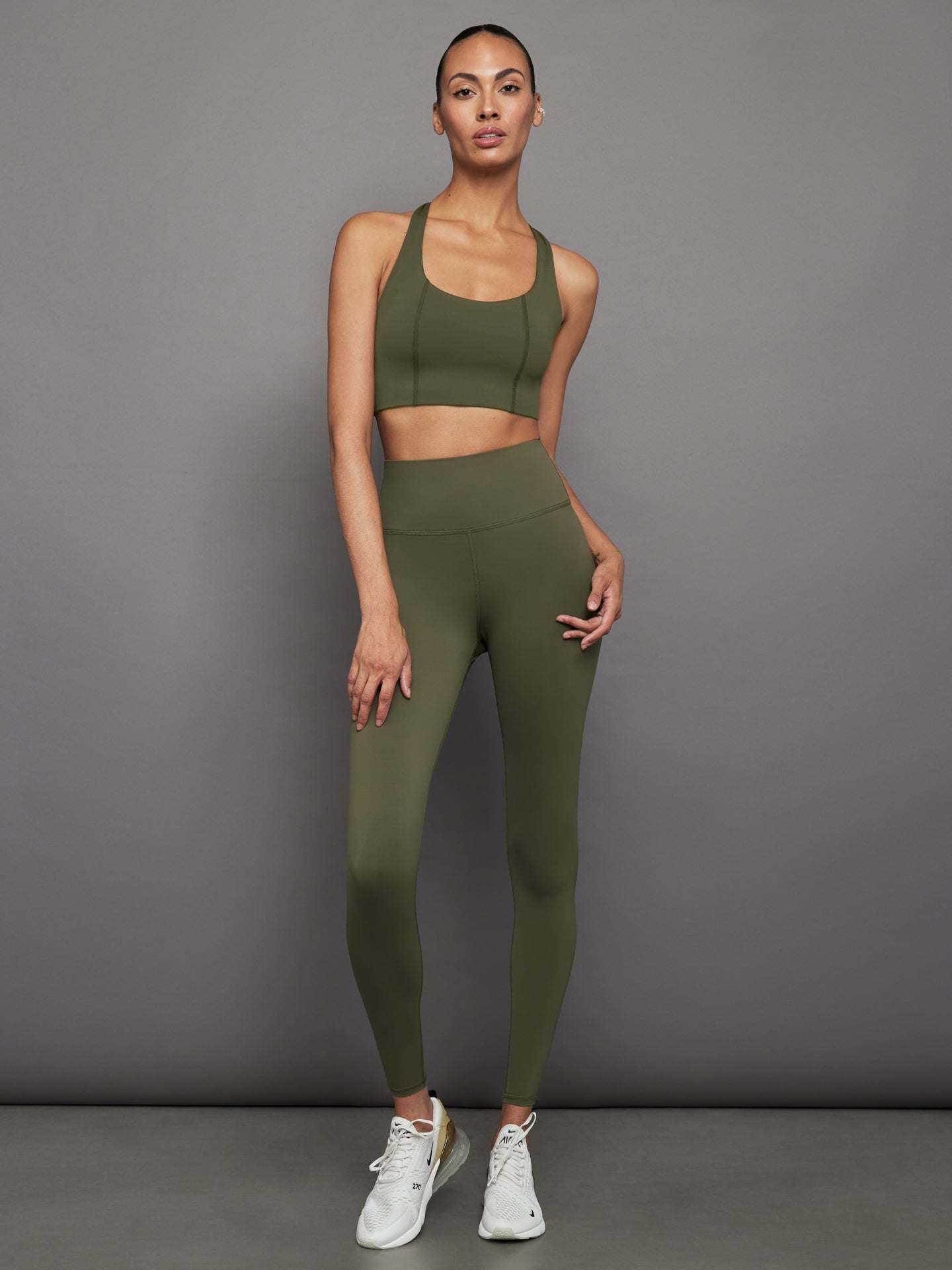 Full outfit view with olive Diamond Compression T Back Bra and matching leggings.
