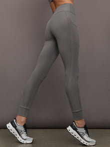 Side profile of Ribbed Melt High Rise Legging in Steel Grey on model.