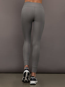 Back view of Ribbed Melt High Rise Legging in Steel Grey on model.