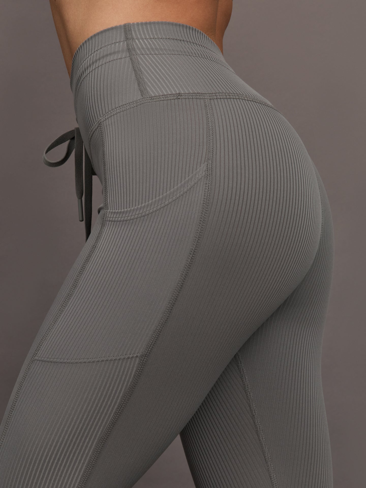Close-up of waistband and ribbed texture on Ribbed Melt High Rise Legging Steel Grey.