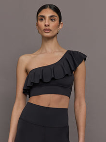 Model wearing the Ruffle One Shoulder Bra in Diamond Compression Black, front view close-up