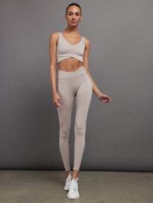 Full outfit view of Heather Melt wrap legging and matching wrap bra in heather oatmeal.