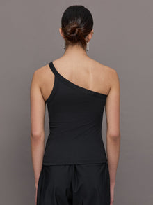 Model wears a black ribbed one shoulder tank.
