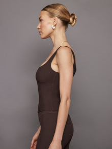 Side profile view of Melt wide scoop bra tank in Dark Oak.