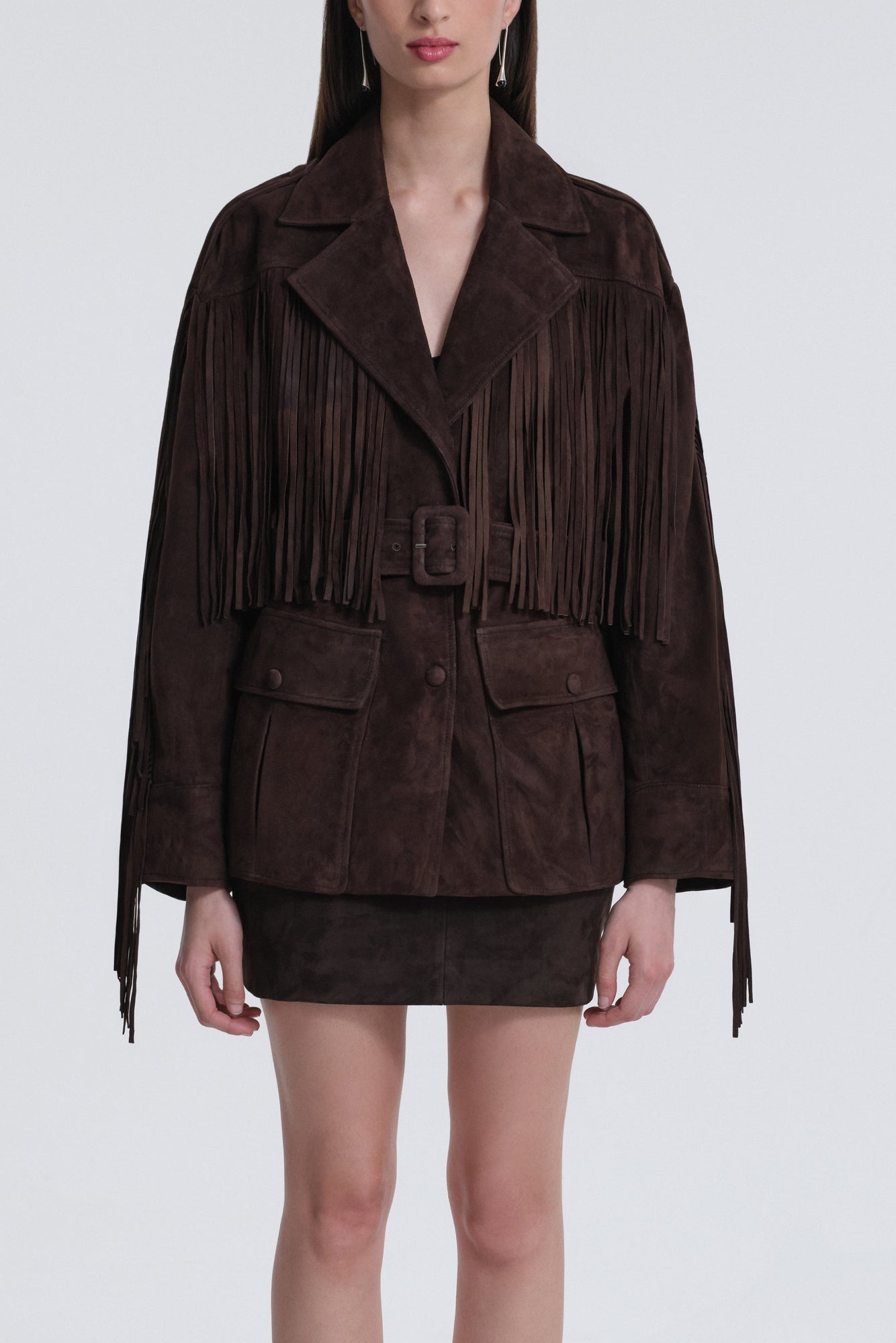 Model is wearing Nour Hammour Cassidy Oversized Suede Fringe Jacket Mocha - Front