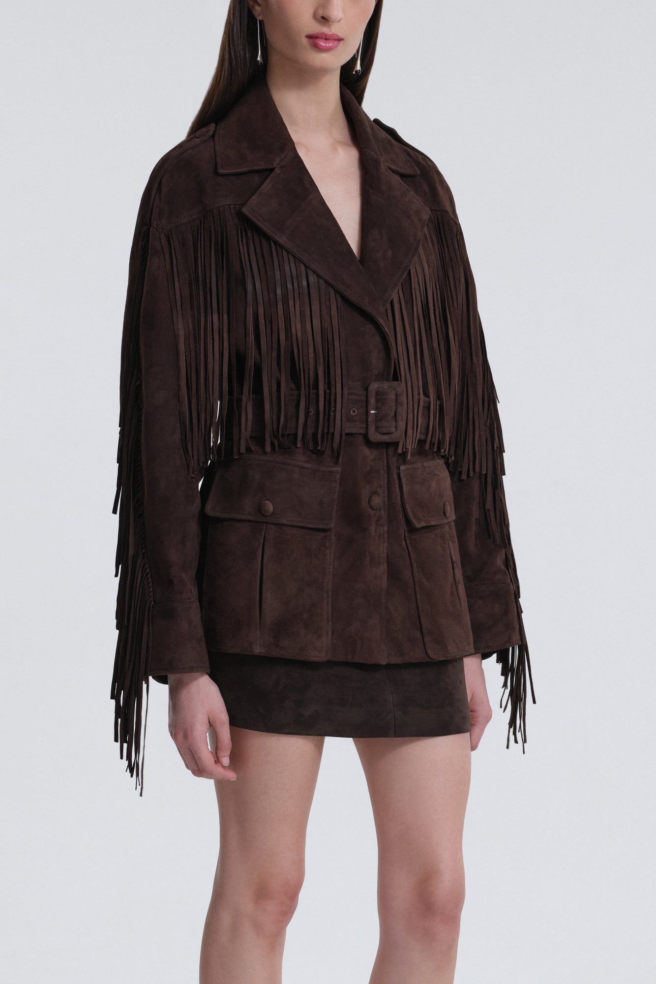 Model is wearing Nour Hammour Cassidy Oversized Suede Fringe Jacket Mocha - Three Quarters