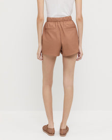 Cole Short in brown cotton, Rylee Pointelle Tank Top in white cotton, and Rita Brown Netted Mary Jane.