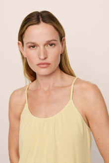 Model is wearing Gisele TENCEL Modal Ruffle Cami & Shortie Short Set in  Sunrise