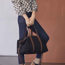 Image 1 of the Canvas Weekender Black on model