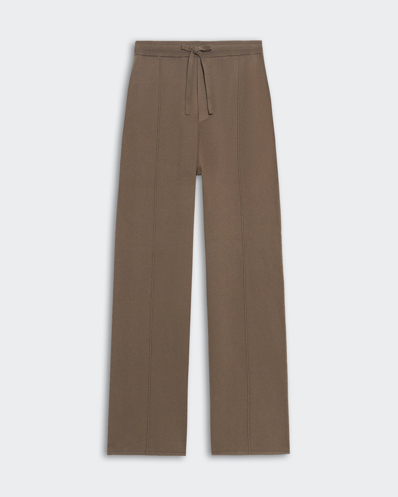 Travel Trouser - Cypress, a straight-leg pant in muted olive green with a drawstring waistband and clean vertical seam detailing, shown laid flat on a light background.
