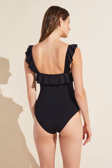 Model wears Jane Smooth One-Piece in black.