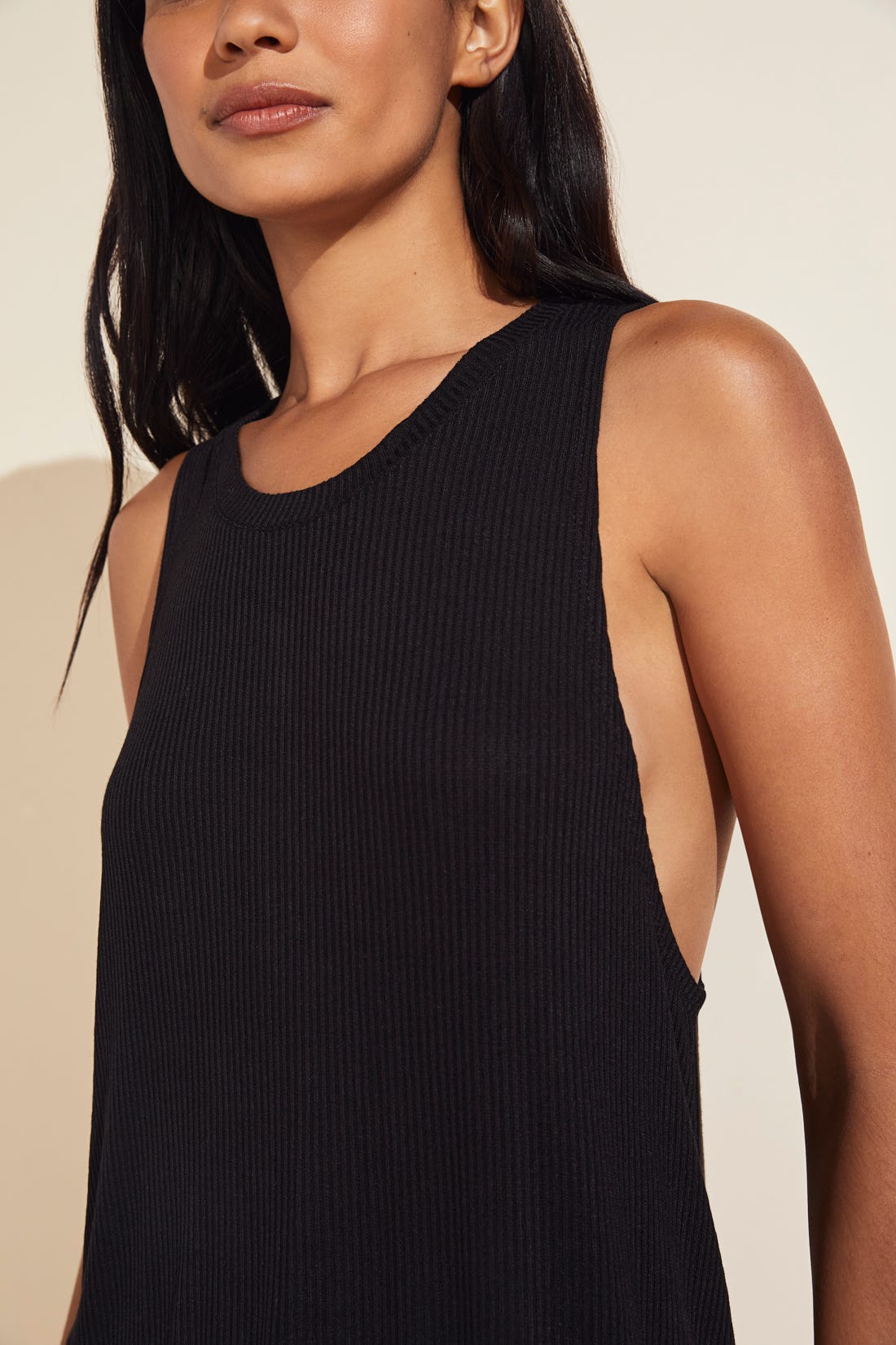 Model wears Elon Relaxed Rib Tank in black,