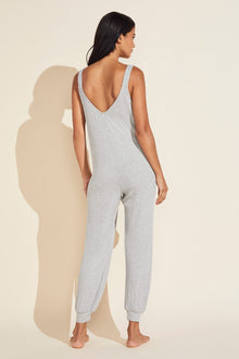 Model wears Elon Relaxed Rib Jumpsuit in Heather Grey.