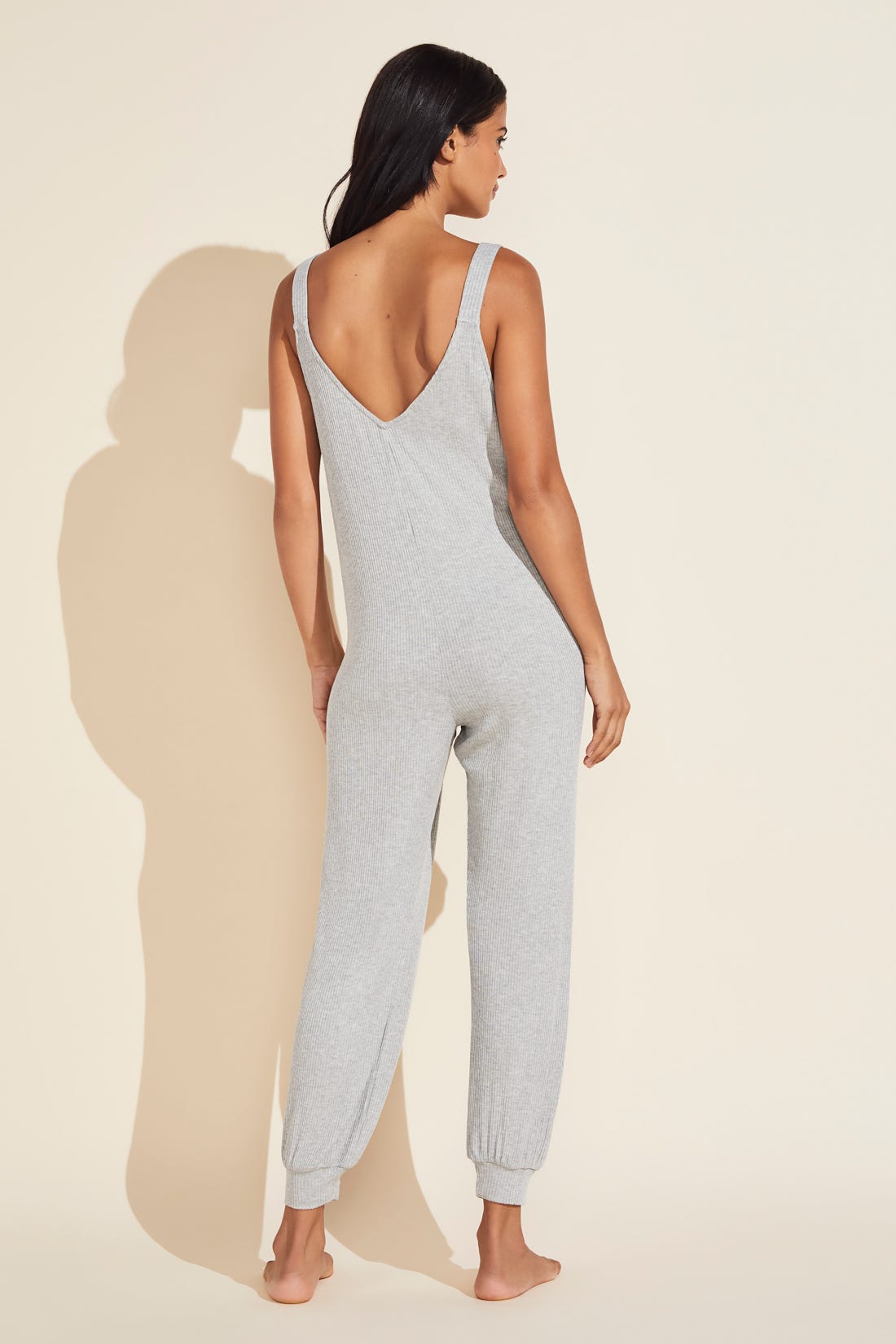 Model wears Elon Relaxed Rib Jumpsuit in Heather Grey.