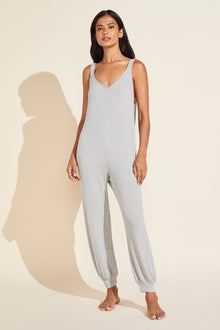 Model wears Elon Relaxed Rib Jumpsuit in Heather Grey.