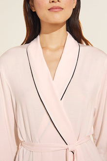 Model is wearing the Gisele TENCEL Modal Robe in sorbet pink/black.