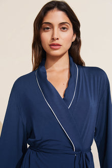 Model is wearing the Gisele TENCEL Modal Robe in navy/ivory.