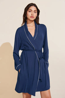 Model is wearing the Gisele TENCEL Modal Robe in navy/ivory.