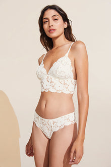 Model wears Naya Longline Bralette in ivory.