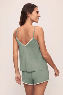 Model is wearing Frida TENCEL Modal Cami & Short PJ Set in Eucalyptus/Ivory