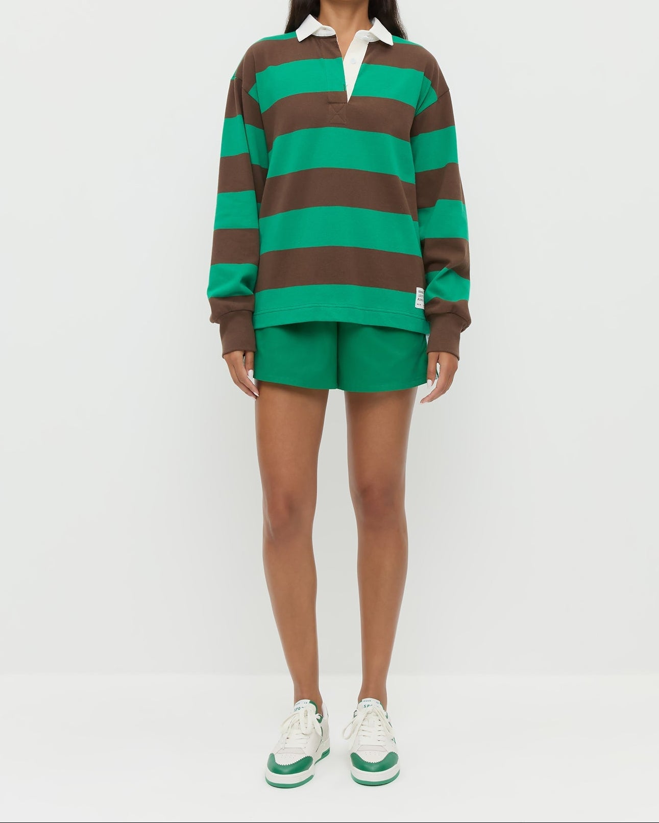 Evan Rugby Shirt in green and brown striped cotton, Cole Short in green cotton, and Topspin Cream/Green Court Sneaker.