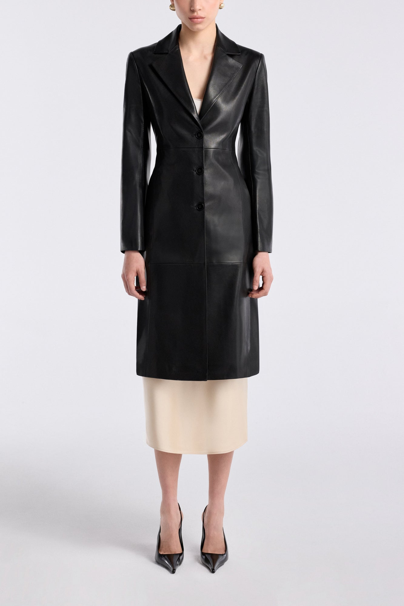 Model is wearing the Nour Hammour Eames Grand Leather Coat Black - Front