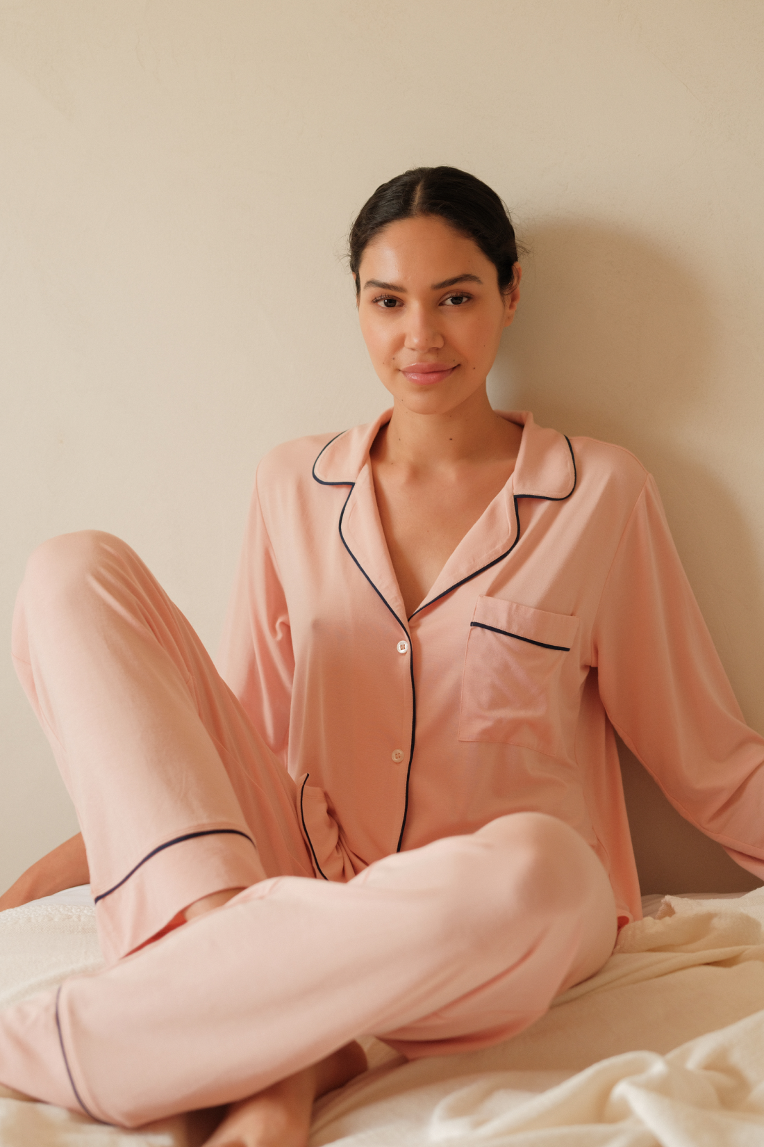 Model is Wearing the Gisele TENCEL™ Modal Long PJ Set in Rose cloud/navy.