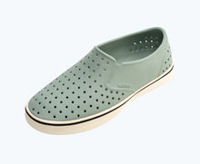 Angled view of a Native Shoes Miles Wanderfoam | Relax Green/ Bone White Footwear