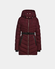 The Rudsak MALAYA M - L123554 Wine is a long maroon women’s down puffer jacket with herringbone quilting, hood, black belt, silver zipper, and black pocket trim, made from recycled matte shell and shown on a plain white background.
