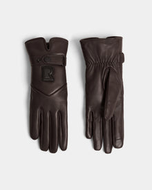 The Rudsak STROMBOLI - 8424510 Espresso gloves feature dark brown leather and cashmere, one showing a gathered palm and the other a snap strap with a raised R logo—stylish womens winter gloves for chilly days.