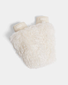 The Rudsak SUSAN M - 8424505 Iceland is a fluffy white hot water bottle with a soft, faux Mongolian fur cover and ribbed openings—ideal for cozy après-ski moments.