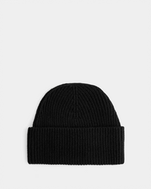 The ANDREY - U425507 Black by Rudsak is a unisex black rib-knit beanie with a folded brim, shown against a plain light gray background.