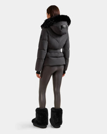 A person wearing the CHRISTELLE M - L125542 Grey weather-resistant puffer jacket by Rudsak stands facing away on a plain white background.