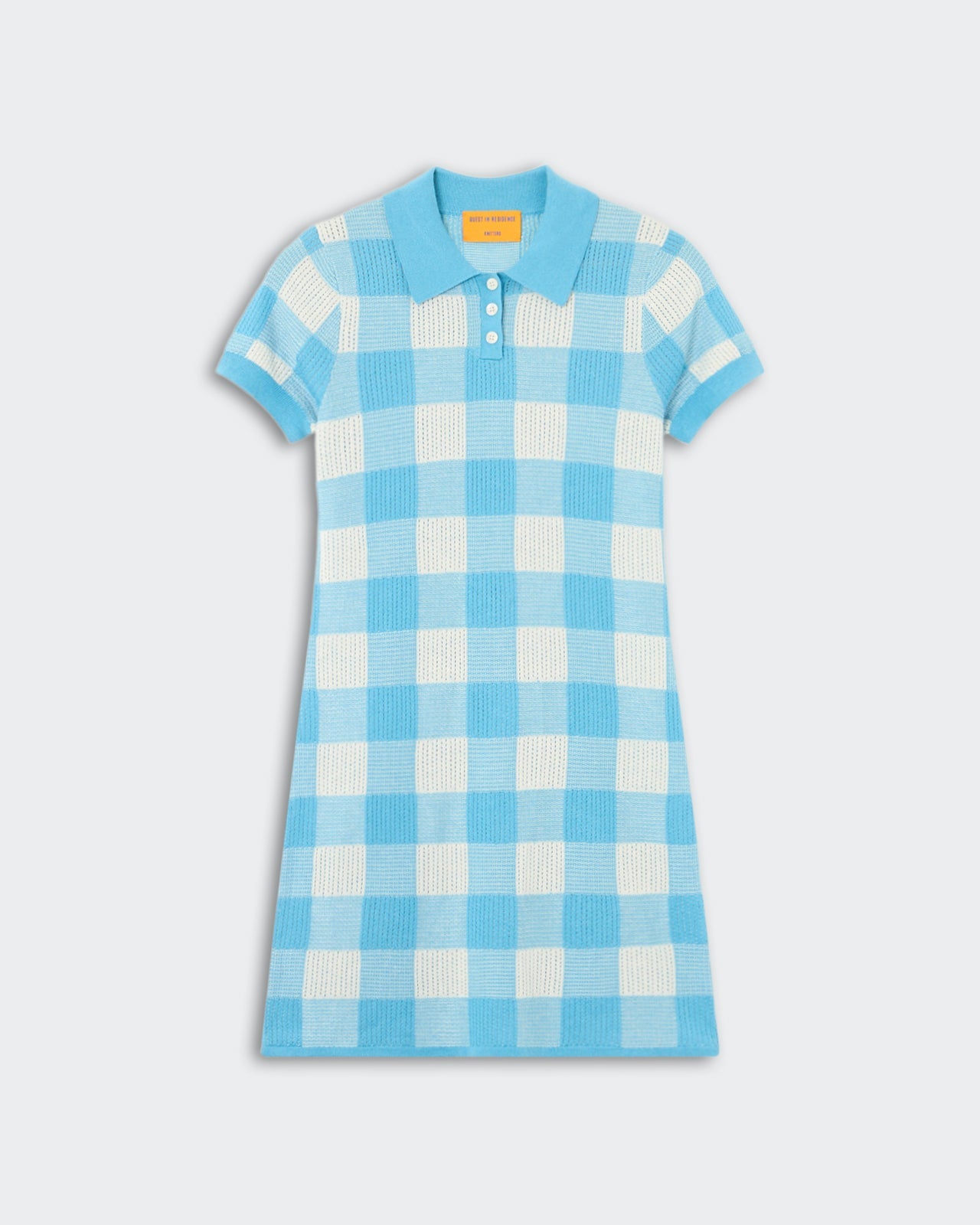 Gingham Polo Dress - Swimming Pool/Cream, a short-sleeve knit dress featuring a classic check pattern in bright blue and cream, with a polo collar and three-button placket, laid flat.