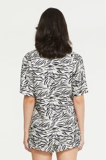 The Zafina Short Sleeve Top in Brush Zebra Print by Ginia