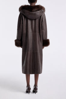 Model is wearing the Nour Hammour Gancin Lavish Winter Coat Lustre Brown - Back
