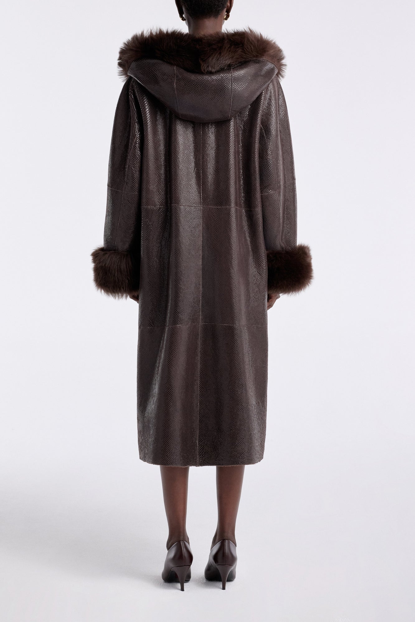 Model is wearing the Nour Hammour Gancin Lavish Winter Coat Lustre Brown - Back