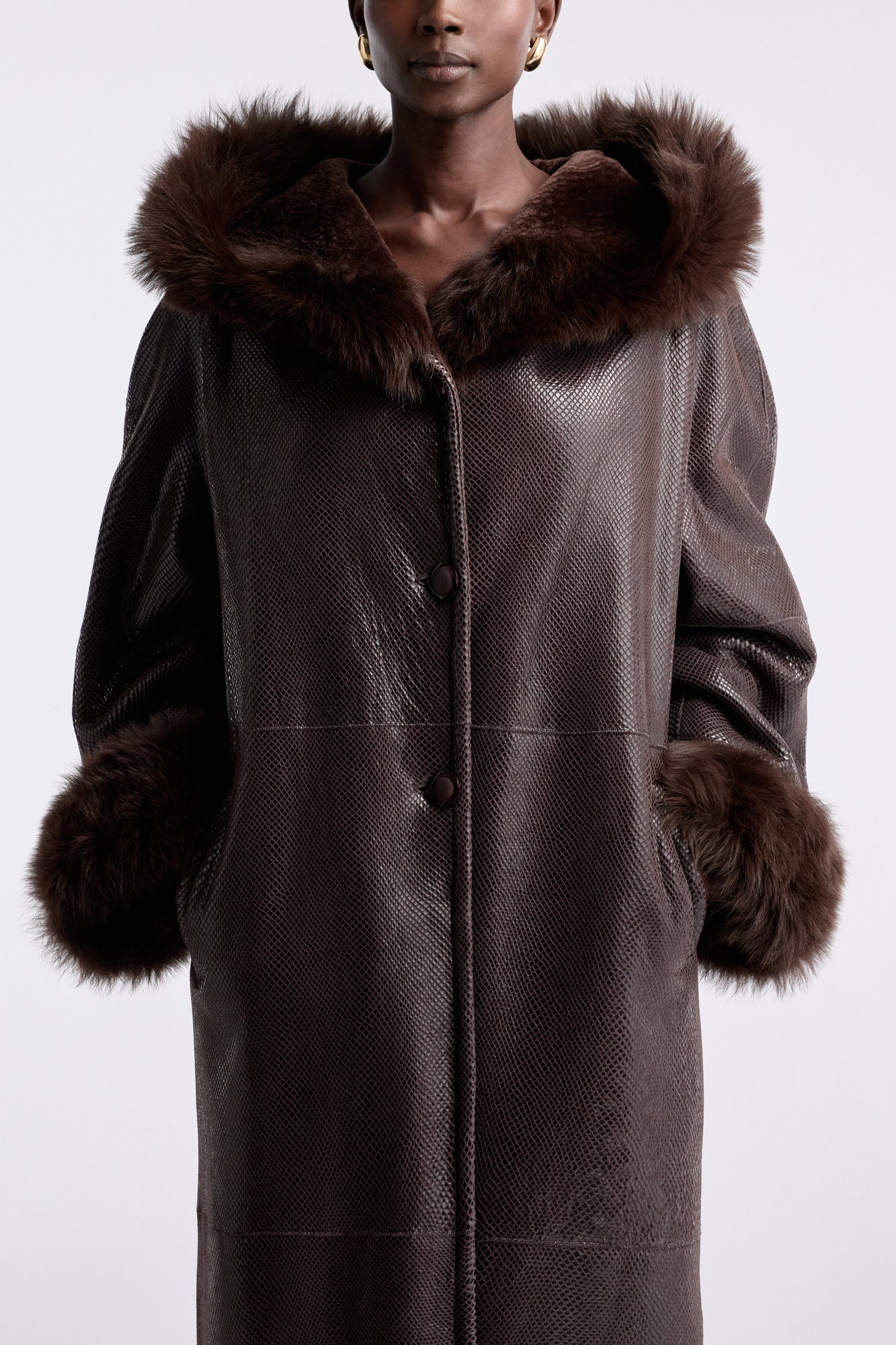 Model is wearing the Nour Hammour Gancin Lavish Winter Coat Lustre Brown - Detail
