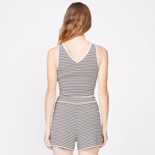 Back view of model wearing the stripe crop lounge tank in ivory stripe.