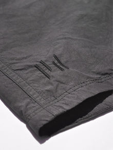 Man Hybrid Trunk - Floral Camo - logo detail