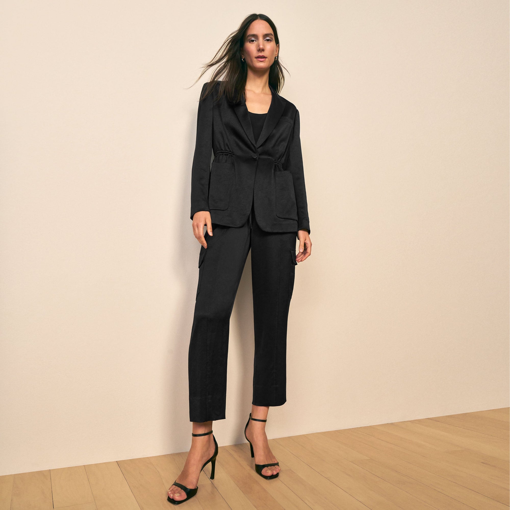 mood image of a woman wearing the hyo jacket in black