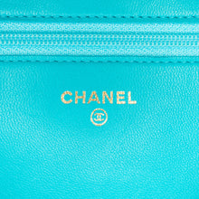 Chanel | Pre-Owned Lambskin Camellia Embossed Wallet On Chain | Blue/Aqua