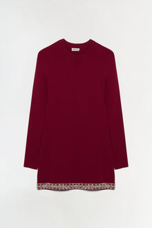 Burgundy knit mini dress with long sleeves and embellished beaded trim at the hem.