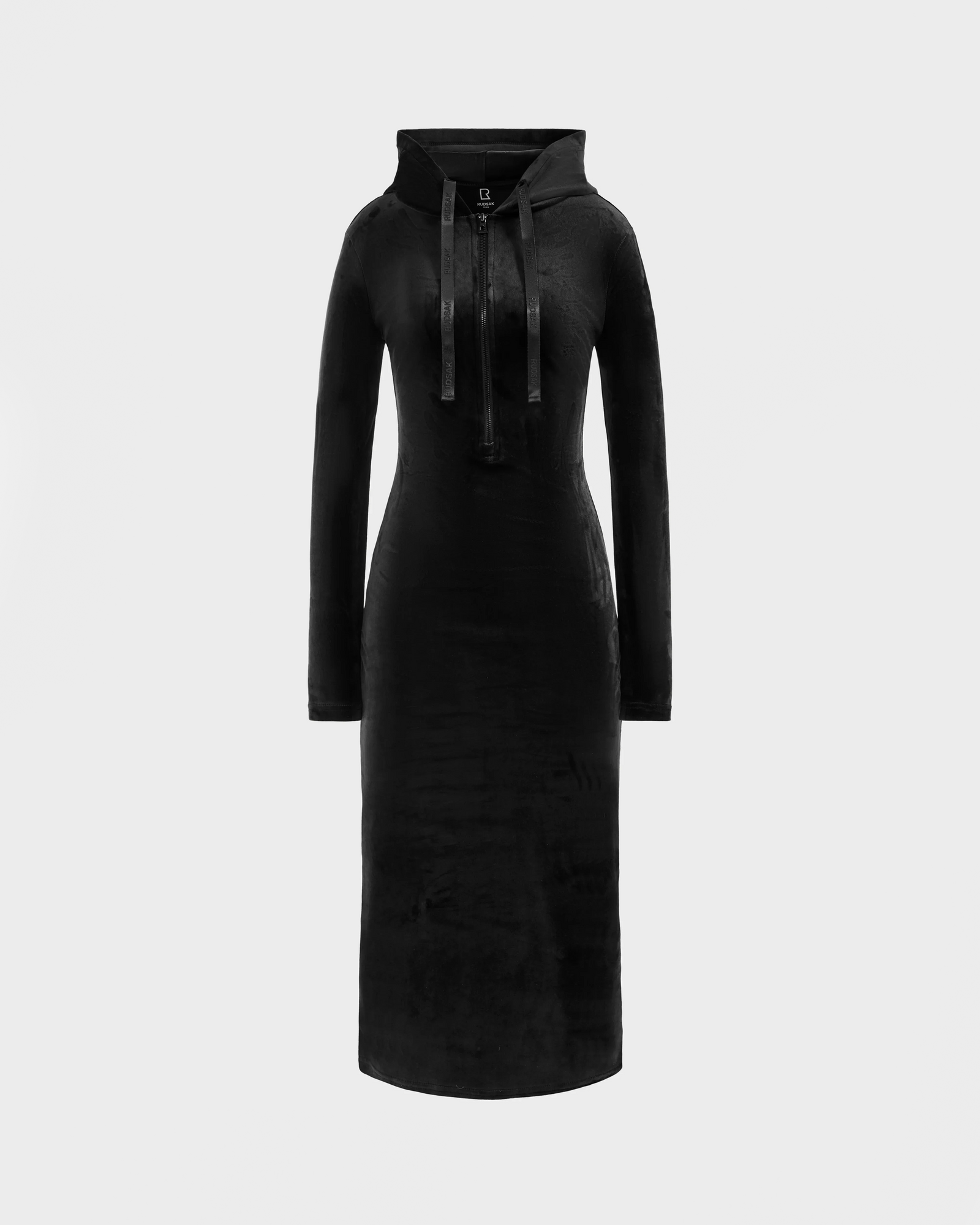 The ISABELLA - L525502 Black by Rudsak is a women's long-sleeve, knee-length black velour hooded dress with a midi silhouette and drawstring ties, displayed on a plain light gray background.