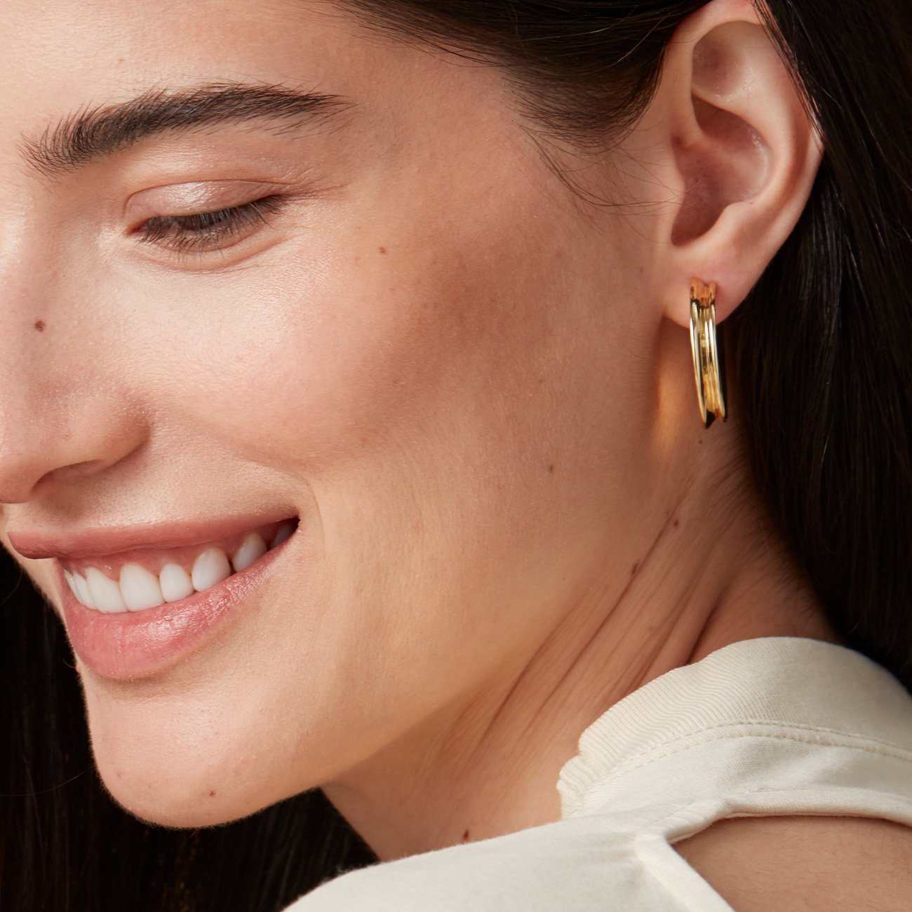 Hidden Heart Hoop Earrings in Gold on Model Close Up